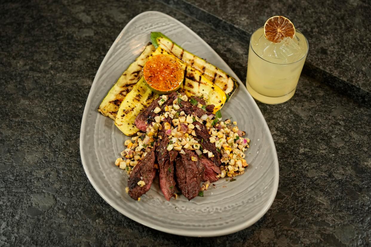 Blackened hangar steak with a Pina Fresca cocktail from Kona Craft Kitchen