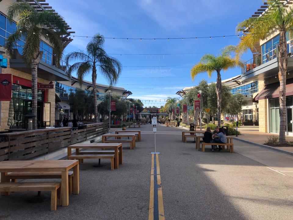 Sidewalks and streets at The Collection in Oxnard were quiet in the morning on Black Friday, with holiday shopping expected to heat up in the afternoon.