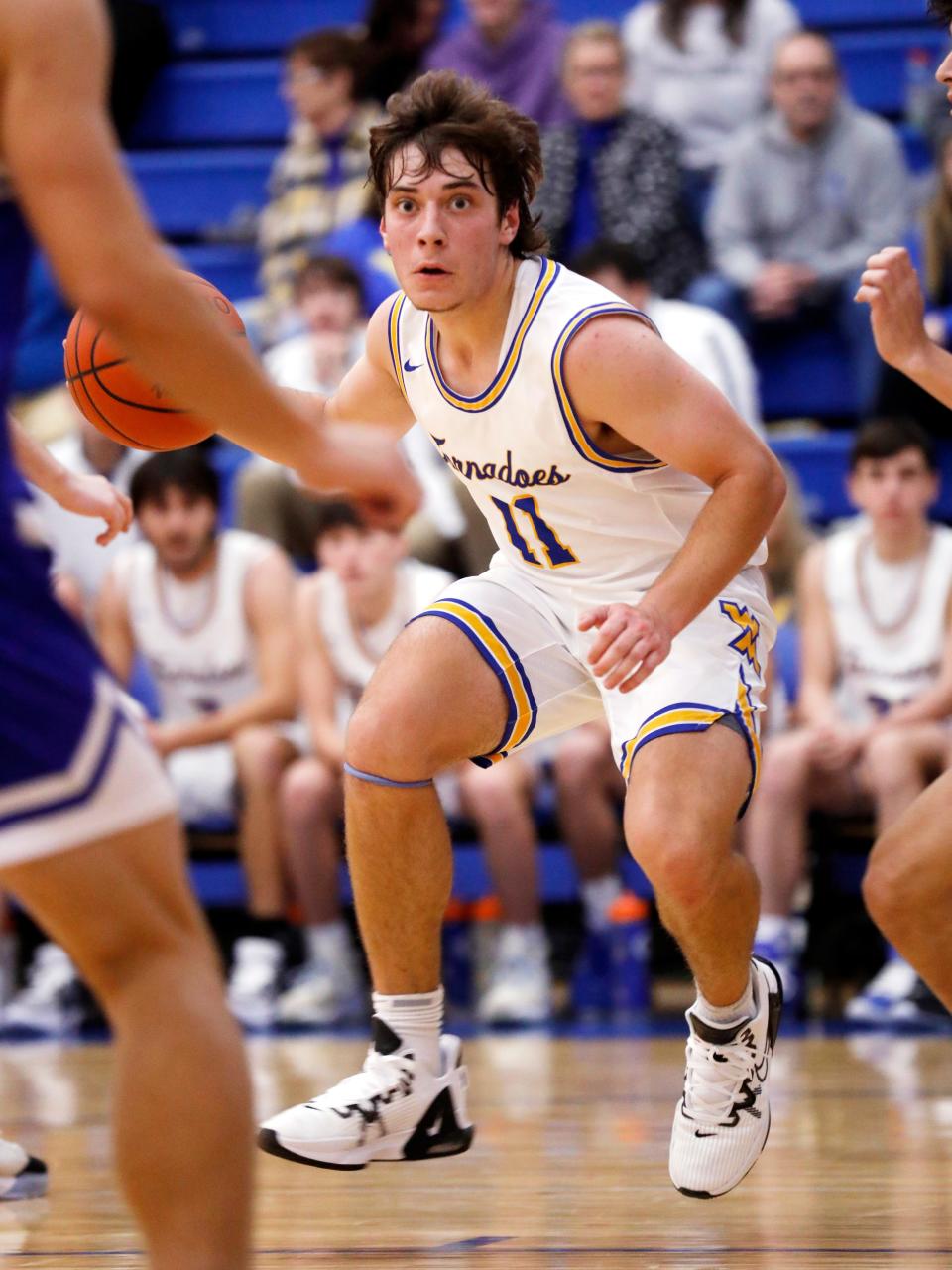 Senior guard Jack Porter looks for driving room during the second half of West Muskingum's 57-37 win against visiting Cambridge on Tuesday night at Gary Ankrum Gymnasium in Falls Township. Porter scored a game-high 22 points.