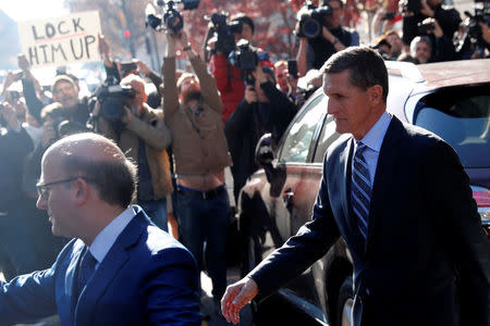 Former U.S. National Security Adviser Michael Flynn departs U.S. District Court, where he was expected to plead guilty to lying to the FBI about his contacts with Russia's ambassador to the United States, in Washington, U.S., December 1, 2017. REUTERS/Jonathan Ernst