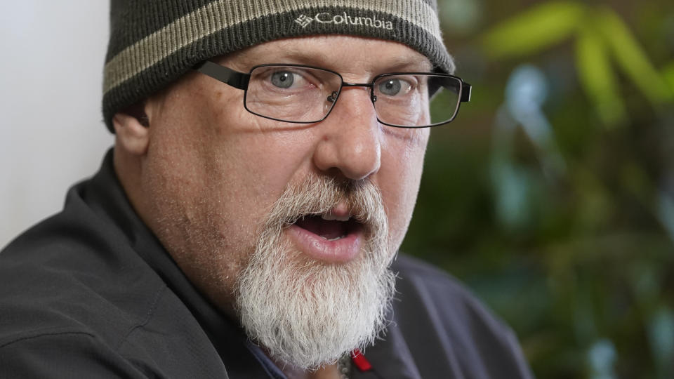 Matthew Butler, who spent 27 years in the Army, speaks during an interview on March 30, 2022, in Sandy, Utah. Butler is now one of the military veterans in several U.S. states who are helping convince conservative lawmakers to take cautious steps toward allowing the therapeutic use of hallucinogenic mushrooms and other psychedelic drugs. (AP Photo/Rick Bowmer)