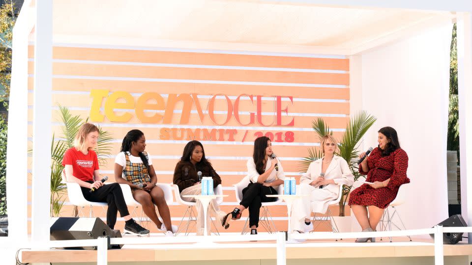 Lily Madigan, Maame Biney, Tia Adeola, Deja Foxx, Cara Delevingne and Samhita Mukhopadhyay speak onstage during the 2018 Teen Vogue Summit in Los Angeles, California. - Vivien Killilea/Getty Images/Teen Vogue