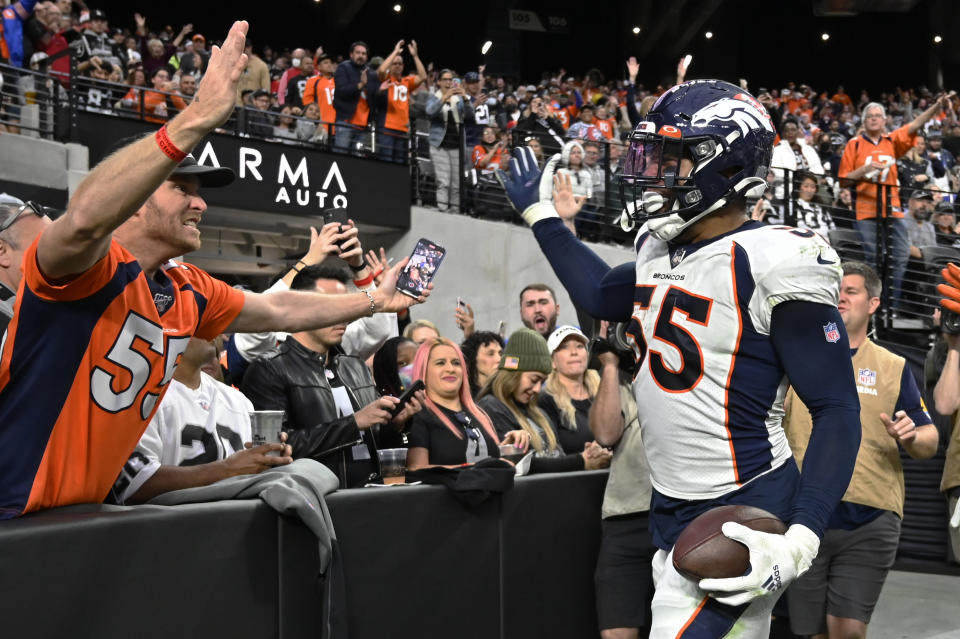 Denver Broncos outside linebacker Bradley Chubb (55) celebrates after making an interception against the Las Vegas Raiders during the first half of an NFL football game, Sunday, Dec. 26, 2021, in Las Vegas. (AP Photo/David Becker)