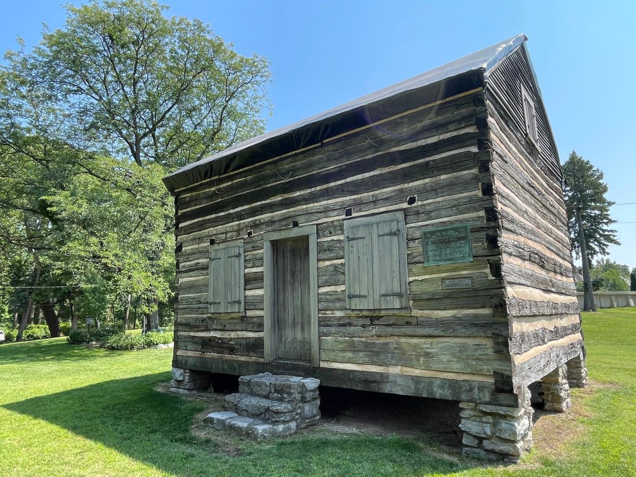 Built in 1820, the Pierre Navarre Cabin in Leeper Park is believed to be the oldest structure and residence in St. Joseph County. A tarp covers its top Aug. 22, 2023, as The History Museum, which owns and maintains the cabin, finds the money to replace a damaged roof.