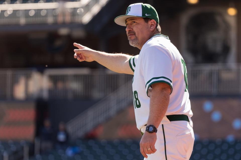 Montwood's head baseball coach Willie Romo directs his team at a game against Rio Rancho Thursday, Feb. 23, 2023, at Southwest University Park in El Paso, Texas.