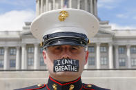 Retired Marine Todd Winn protests in front of the Utah State Capitol Friday, June 5, 2020, in Salt Lake City. (AP Photo/Rick Bowmer)