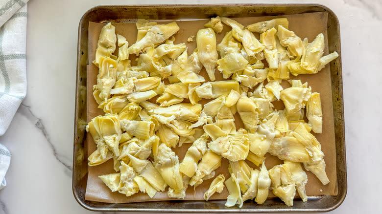 artichoke hearts on baking sheet