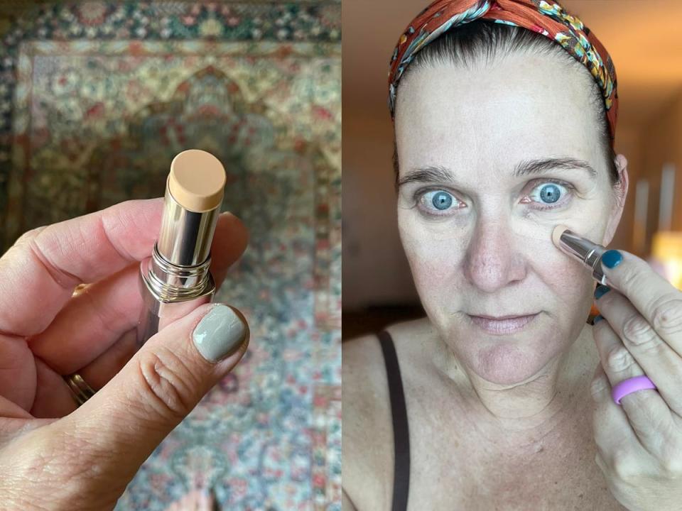 The writer holds a stick concealer over a rug; the writer runs stick concealer under her eyes