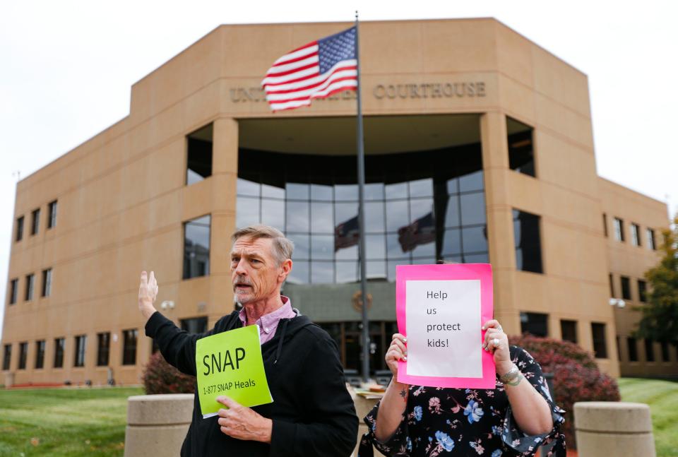 David Clohessy, the former national director of SNAP (Survivors Network of those Abused by Priests), talks about the late Jason Britt outside the U.S. federal courthouse in Springfield on Tuesday, Oct. 24, 2023. Britt died last year of multiple organ failure at age 29, more than a decade after attending Agape Boarding School.