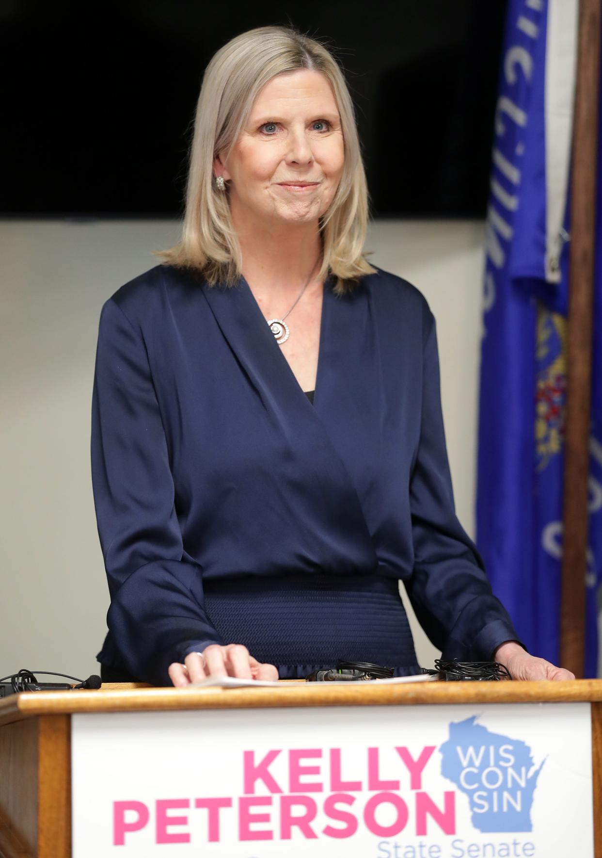 Kelly Peterson speaks during a press conference launching her candidacy for the 2nd Senate District on Thursday in Appleton.