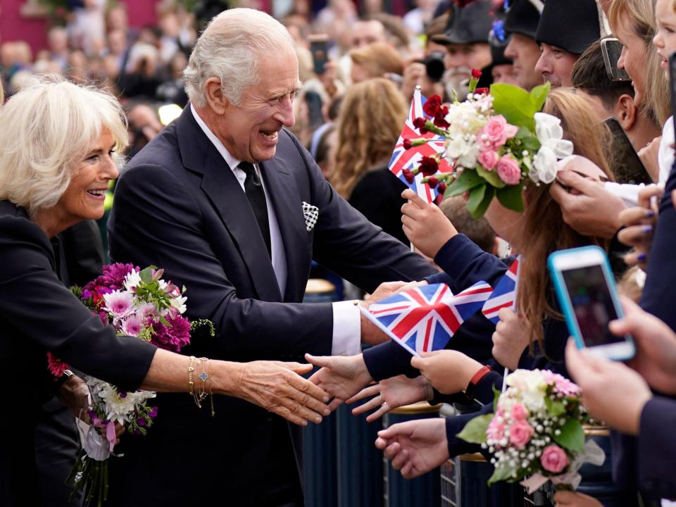 King Charles III and Camilla, Queen Consort greet wellwishers as they arrive at Hillsborough Castle in Belfast on September 13, 2022