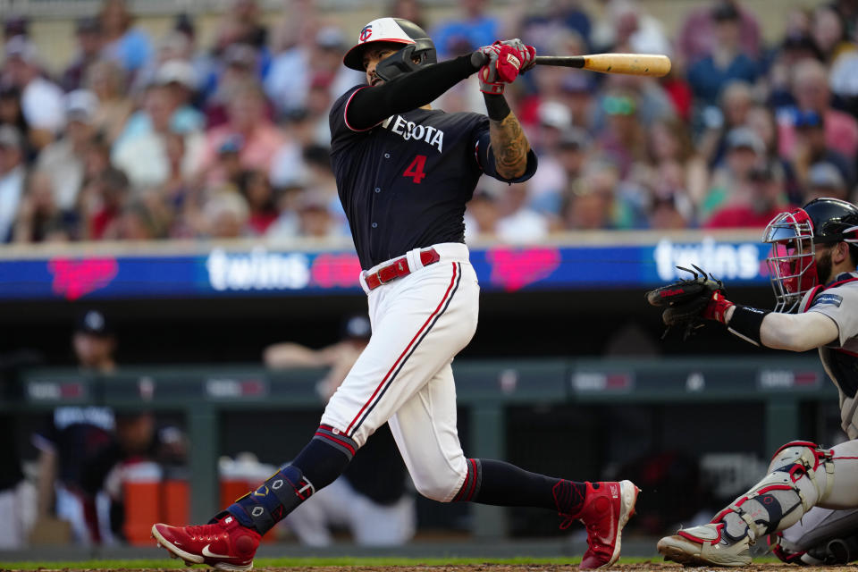 Minnesota Twins' Carlos Correa strikes out during the fifth inning of the team's baseball game against the Boston Red Sox, Tuesday, June 20, 2023, in Minneapolis. (AP Photo/Abbie Parr)