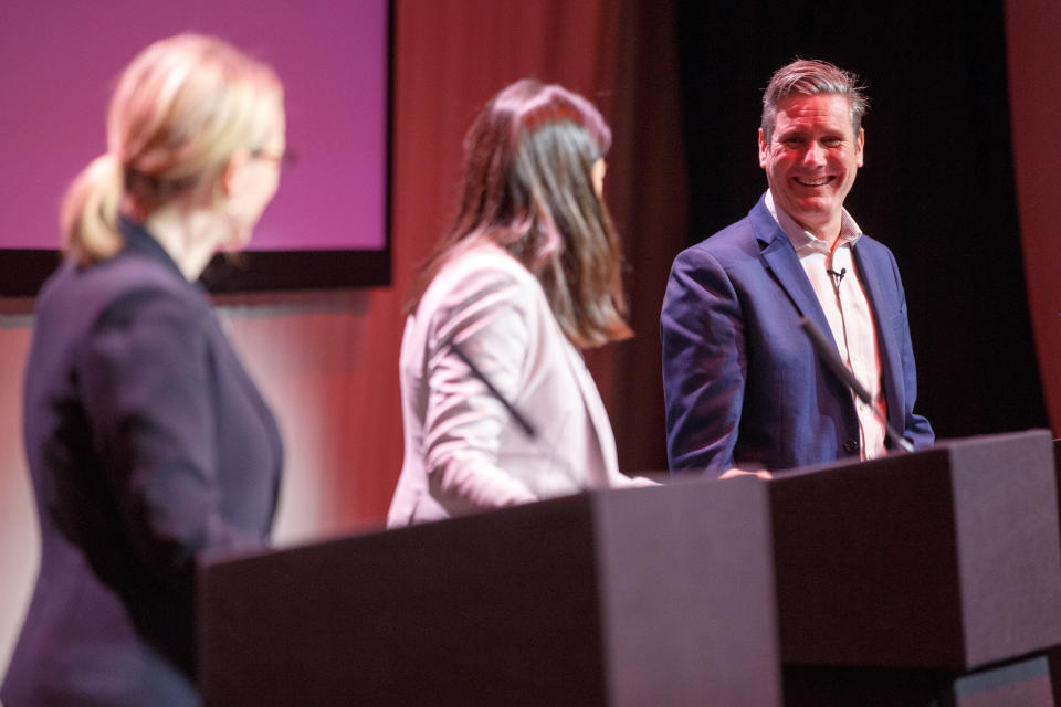 GLASGOW, SCOTLAND - FEBRUARY 15: Sir Keir Starmer (R) smiles towards Lisa Nandy (C) and Rebecca Long-Bailey at the Labour leadership hustings on the stage at SEC in Glasgow on February 15, 2020 in Glasgow, Scotland. Sir Keir Starmer, Rebecca Long-Bailey and Lisa Nandy are vying to replace Labour leader Jeremy Corbyn, who offered to step down following his party's loss in the December 2019 general election. Emily Thornberry was eliminated from the race yesterday after failing to secure enough nominations from local constituency parties. (Photo by Robert Perry/Getty Images)