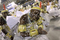 Performers from the Grande Rio samba school parade during Carnival celebrations at the Sambadrome in Rio de Janeiro, Brazil, Monday, Feb. 24, 2020. (AP Photo/Silvia Izquierdo)