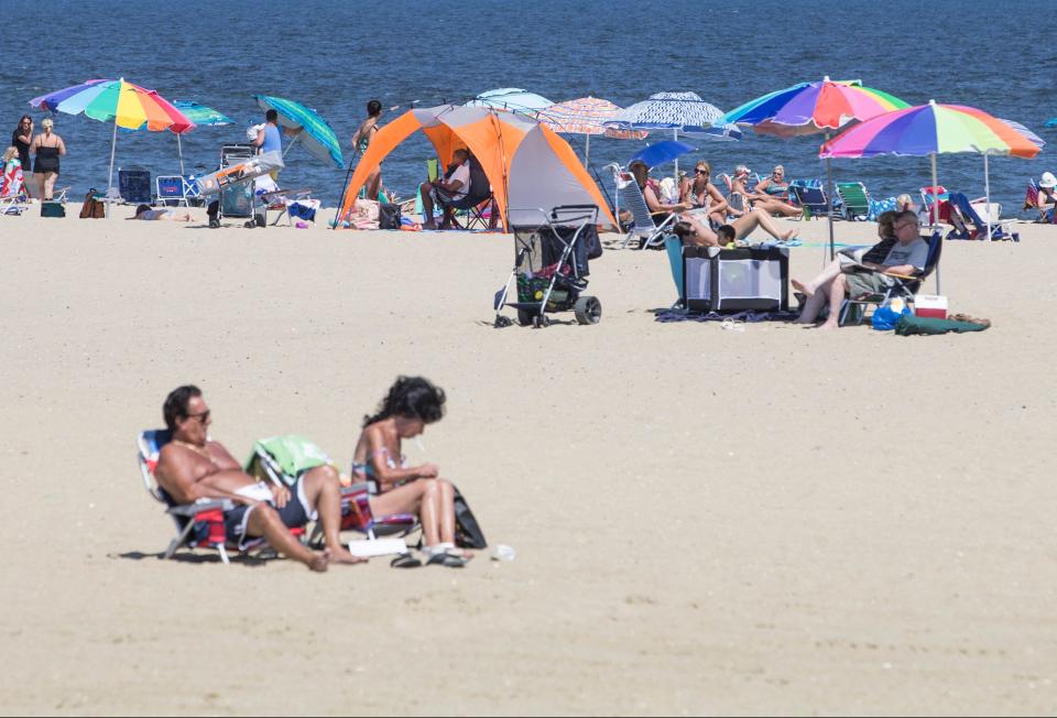 Tents and canopies set up on the beach in Belmar in a 2017 file photo.