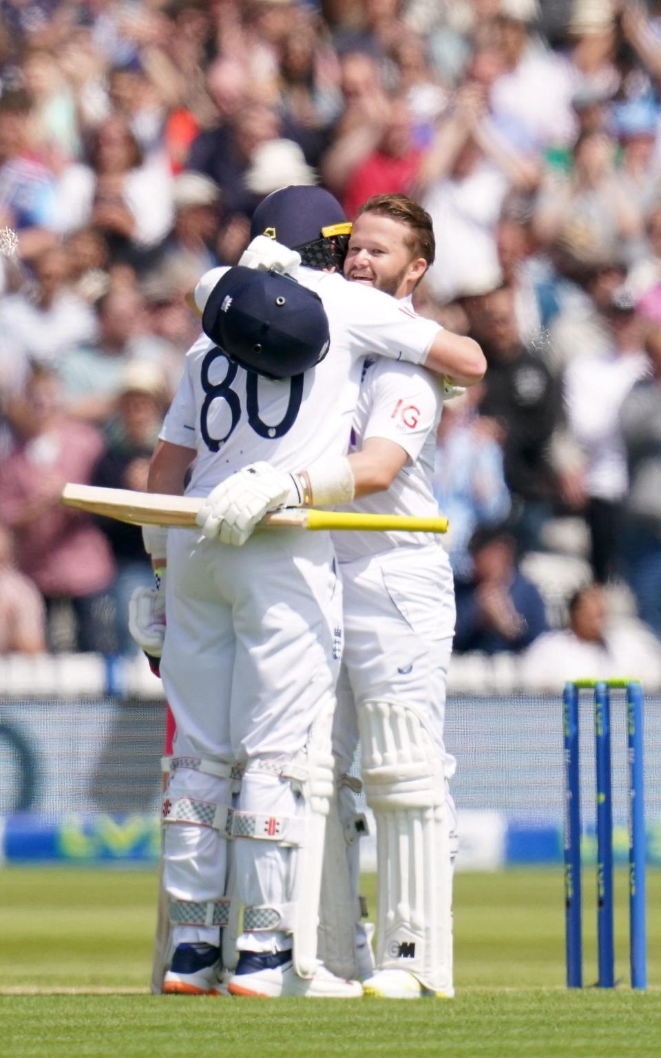 Ben Duckett celebrates his century with Ollie Pope - John Walton/PA