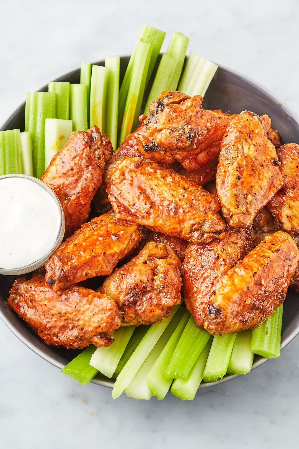 <p><a href="https://www.delish.com/cooking/recipe-ideas/a23941739/fried-chicken-wings-recipe/" rel="nofollow noopener" target="_blank" data-ylk="slk:Fried chicken wings;elm:context_link;itc:0;sec:content-canvas" class="link ">Fried chicken wings</a> are delicious, but they make a big mess with all that oil. These air fryer wings, on the other hand, are super easy to prepare and they're just as crunchy as the deep-fried kind. We're hooked!</p><p>Get the <strong><a href="https://www.delish.com/cooking/recipe-ideas/a27169627/air-fryer-chicken-wings-recipe/" rel="nofollow noopener" target="_blank" data-ylk="slk:Air Fryer Chicken Wings recipe;elm:context_link;itc:0;sec:content-canvas" class="link ">Air Fryer Chicken Wings recipe</a>.</strong></p>