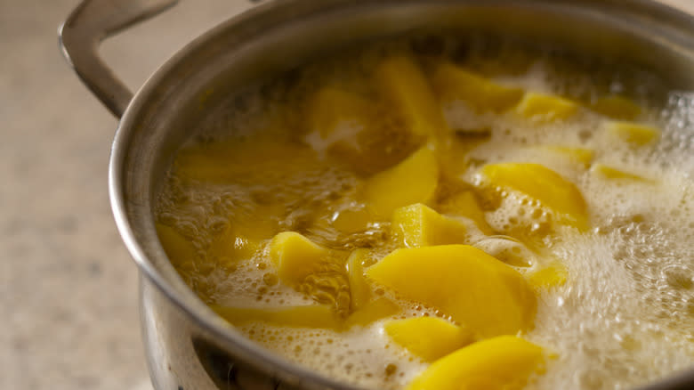 potatoes boiling in a pot