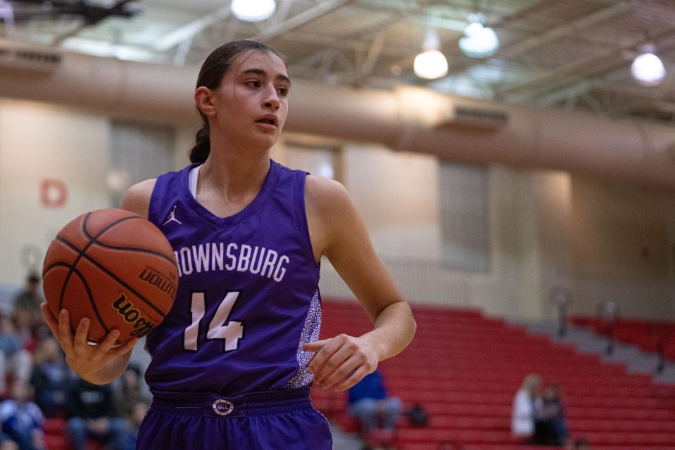 Brownsburg Bulldog sophomore power forward Elle McCulloch looks to pass the ball Jan 5, 2024, at Plainfield High School in Plainfield, Indiana.