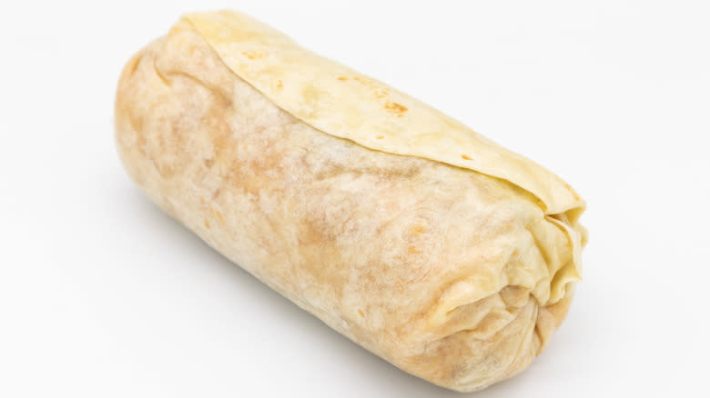 A large overfilled burrito