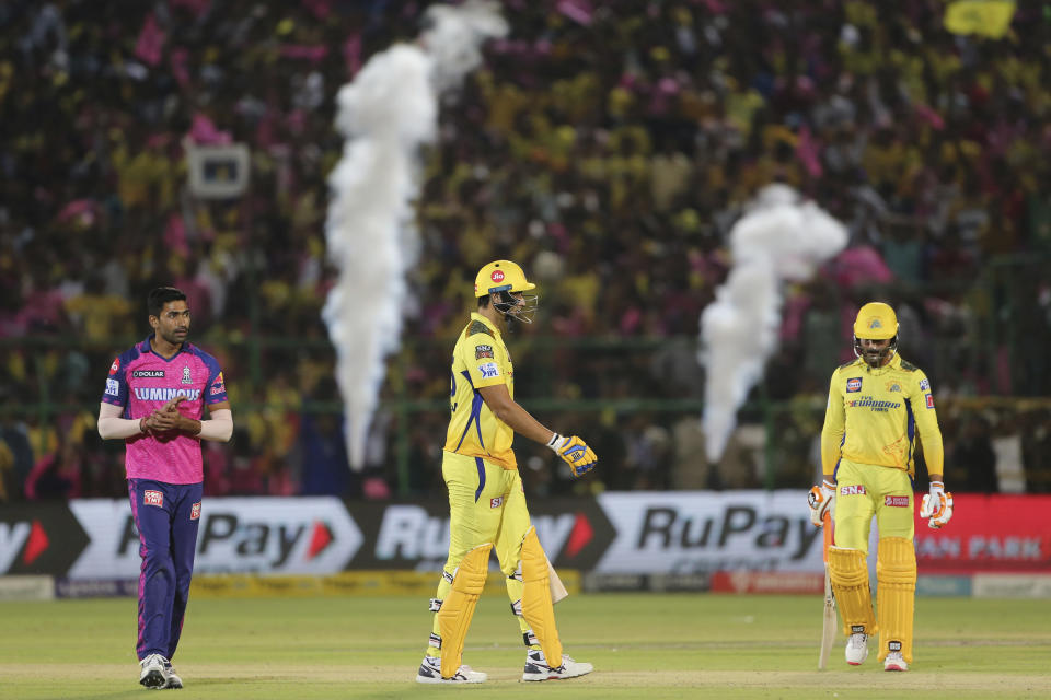 Kuldip Yadav of Rajasthan Royals, left, celebrates after winning the the Indian Premier League cricket match between Rajasthan Royals and Chennai Super Kings in Jaipur, India, Thursday, April 27, 2023. (AP Photo/Surjeet Yadav)