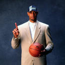 <p>1997: Tim Duncan poses for a photo after being selected by the San Antonio Spurs at the 1997 NBA Draft in New York, New York.<br></p>
