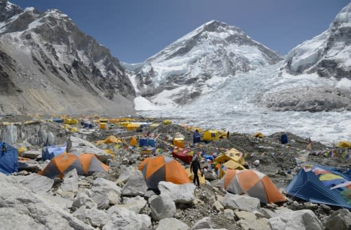 A climber walks through base camp below Everest, which is suffering from a dangerous shortage of its most important resource: experienced Sherpa guides