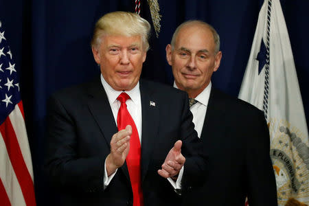 U.S. President Donald Trump applauds after a ceremonial swearing-in for U.S. Homeland Security Secretary John Kelly at Homeland Security headquarters in Washington, U.S., January 25, 2017. REUTERS/Jonathan Ernst