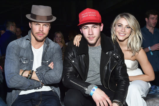 Apparently, this was a night for celebrity siblings. Reality star Derek Hough (left) and his sis, Julianne, hung out with Nick Jonas, whose brother Joe was at same fete. (Photo: Mike Coppola/Getty Images for DirecTV)