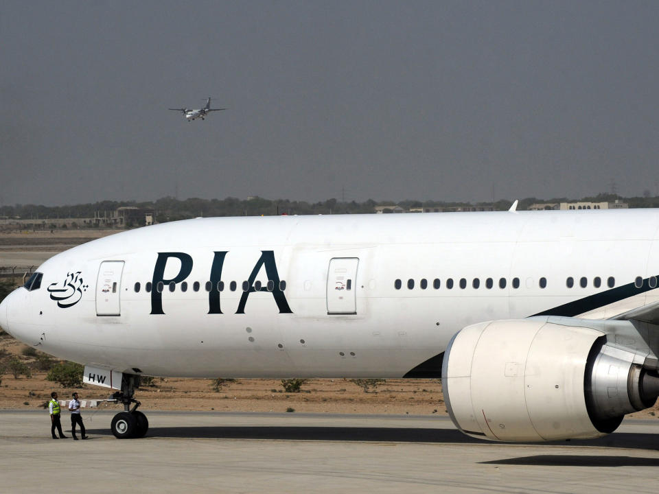 Pakistan International Airlines (PIA) plane taxies before take-off from Karachi International Airport in Karachi: GETTY