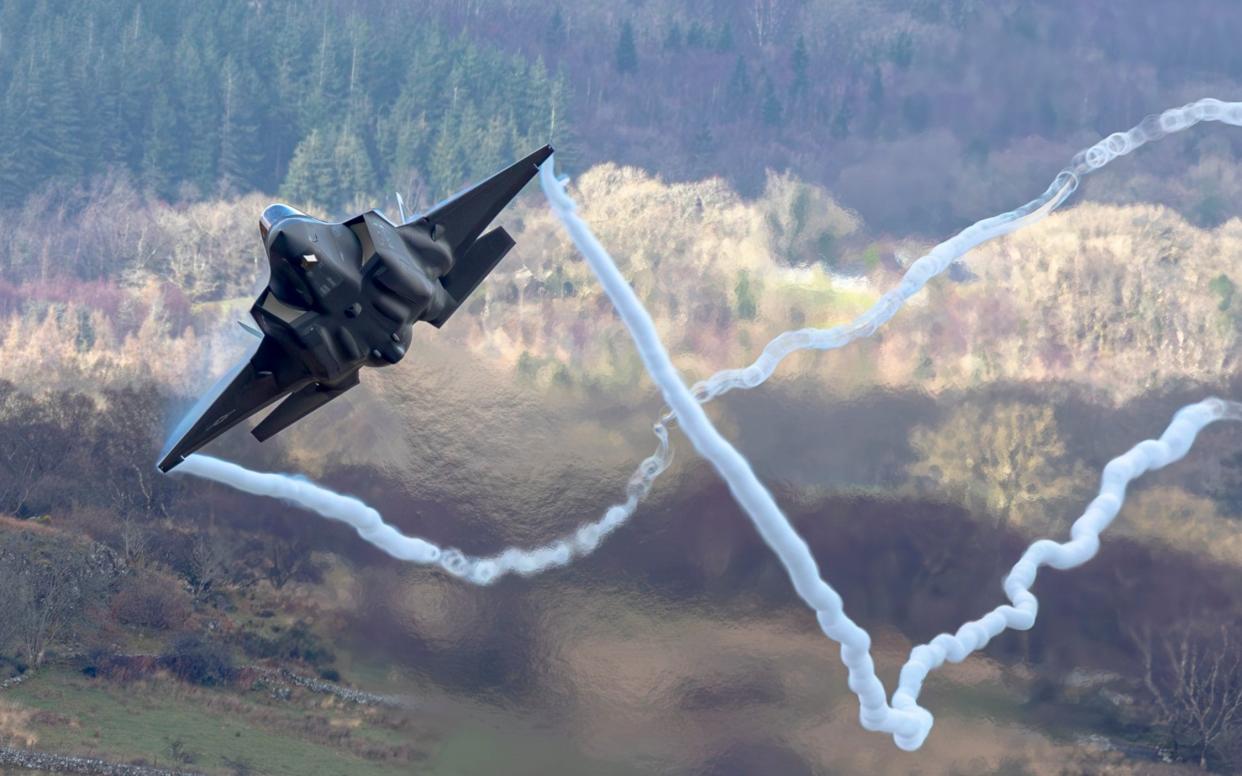 The aircraft was pictured leaving 'fluffy' condensation trails in the sky