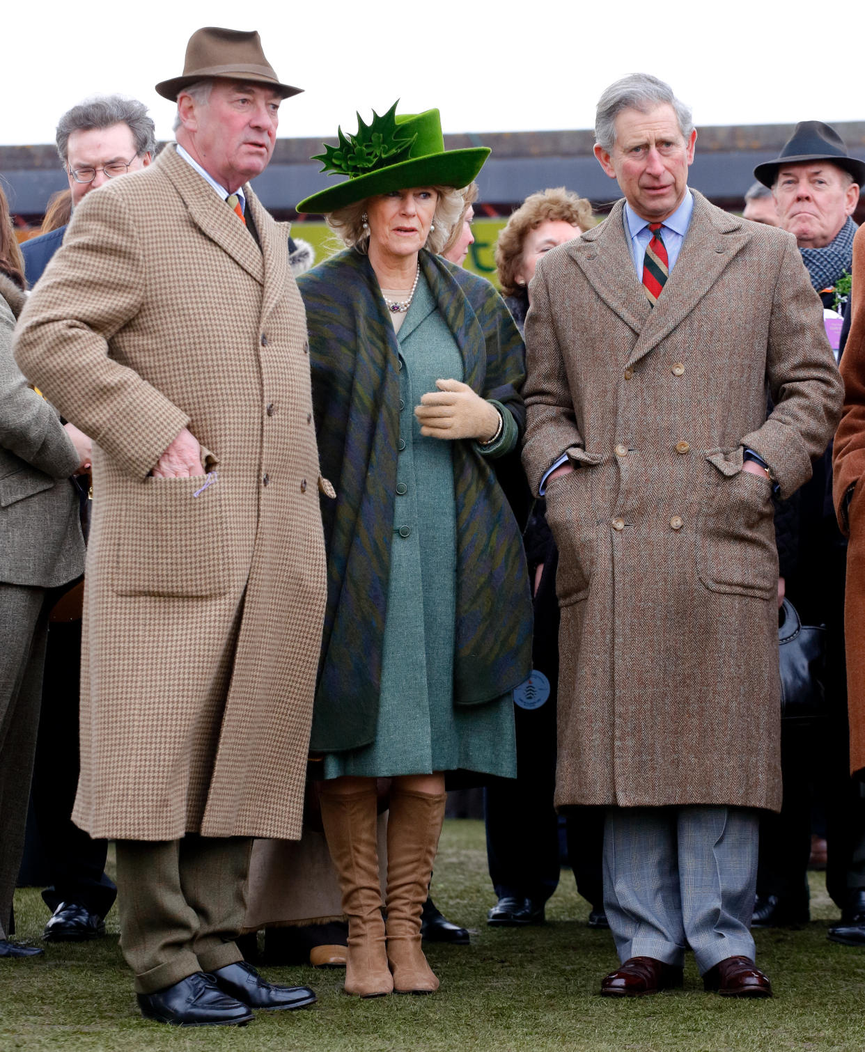 CHELTENHAM, UNITED KINGDOM - MARCH 17: (EMBARGOED FOR PUBLICATION IN UK NEWSPAPERS UNTIL 24 HOURS AFTER CREATE DATE AND TIME) Lord Samuel Vestey, Camilla, Duchess of Cornwall (wearing a St Patrick's Day themed hat adorned with shamrocks, designed by Philip Treacy) and Prince Charles, Prince of Wales attend day 4 'Gold Cup Day' of the Cheltenham Festival at Cheltenham Racecourse on March 17, 2006 in Cheltenham, England. (Photo by Max Mumby/Indigo/Getty Images)
