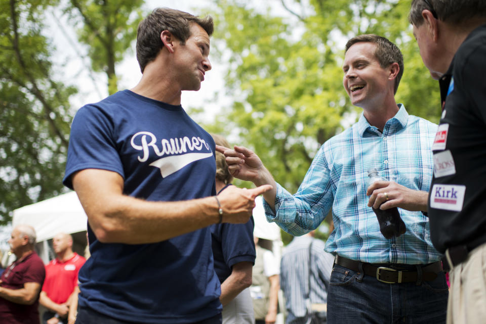 UNITED STATES - AUGUST 14: Reps. Rodney Davis, R-Ill., right, and Aaron Schock, R-Ill., attend Republican Day at the Illinois State Fair in Springfield, Ill., August 14, 2014. (Photo By Tom Williams/CQ Roll Call)