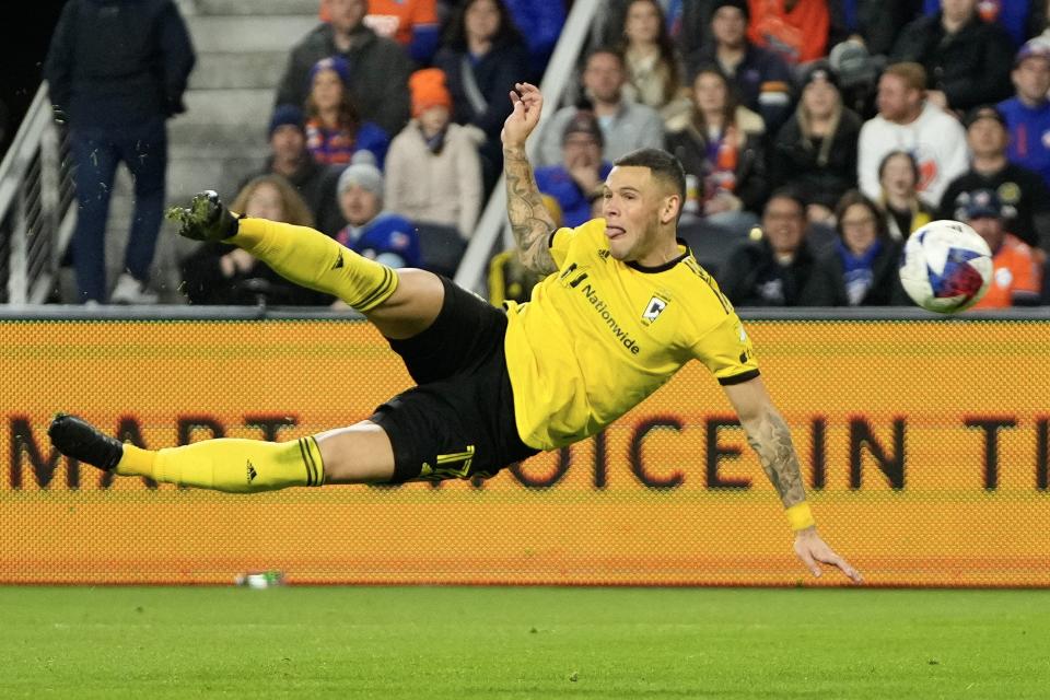 Crew forward Christian Ramirez attempts a bicycle kick during the second half of the MLS Cup Eastern Conference Finals against the FC Cincinnati.