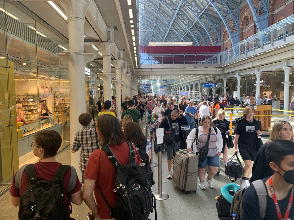 These pictures show long queues for Eurostar from St Pancras today (Sun) - as delays hit rail links to France as well as ferries. See SWNS story SWOCeurostar. Frustrated travellers say there were over 1,000 people queueing from around 10am to 11am. They said the queue went from each end of the station  - about 250 metres - and people were waiting outside one point. One traveller said: ''A station announcement apologised for delays, saying, ‘due to tighter rules for travel and enhanced COVID checks, the checking process is taking longer than usual’.  