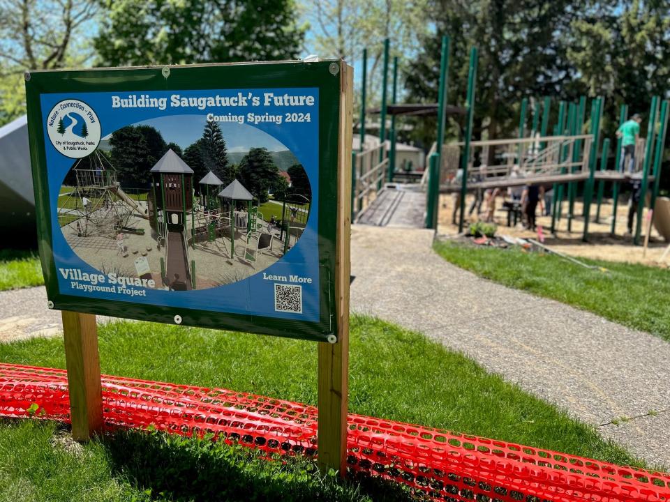 The community build of a new playground in Saugatuck is underway Tuesday, May 7.