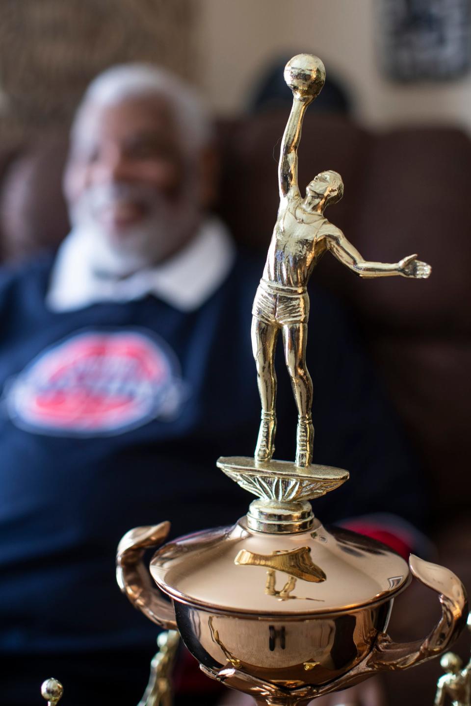 Ray Scott, 82, who was awarded NBA Coach of the Year for the 1973-74 season, poses for photo at home in Ypsilanti Township on Saturday, Feb. 13, 2021.