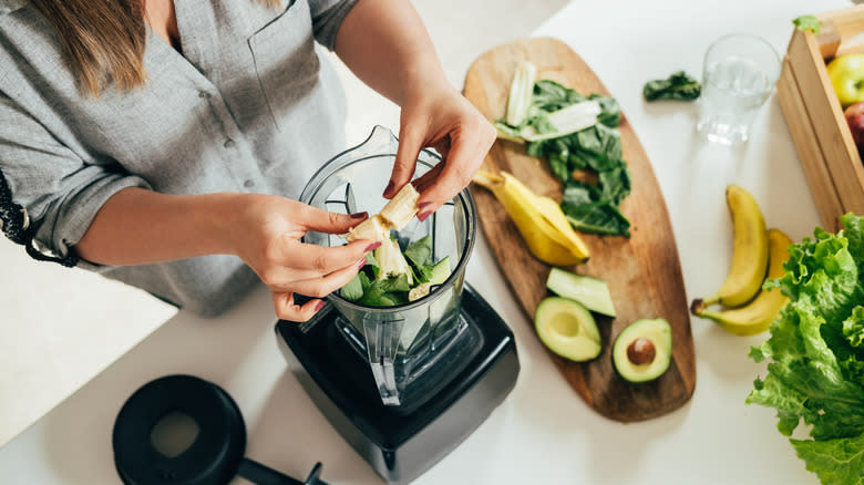 smoothie being made with avocado 