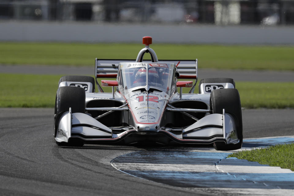 Race driver Will Power, of Australia, drives through a turn during qualifying for the IndyCar auto race at Indianapolis Motor Speedway in Indianapolis, Friday, July 3, 2020. (AP Photo/Darron Cummings)