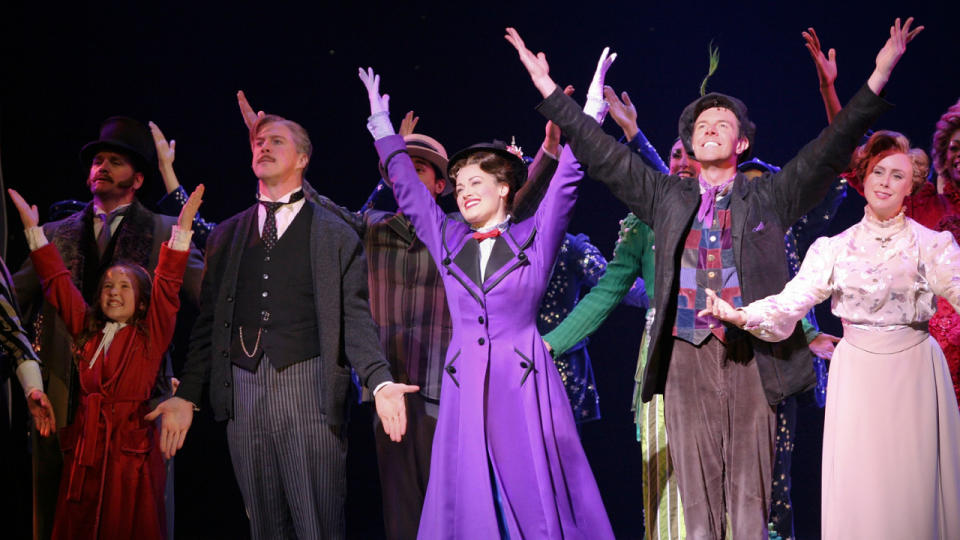 LOS ANGELES, CA - NOVEMBER 15: (L-R) Cast members Bailey Grey, Karl Kenzler, Ashley Brown (Mary Poppins), Gavin Lee (Bert) and Megean Osterhaus take their bows during the curtain call for Disney and Cameron Mackintosh's 