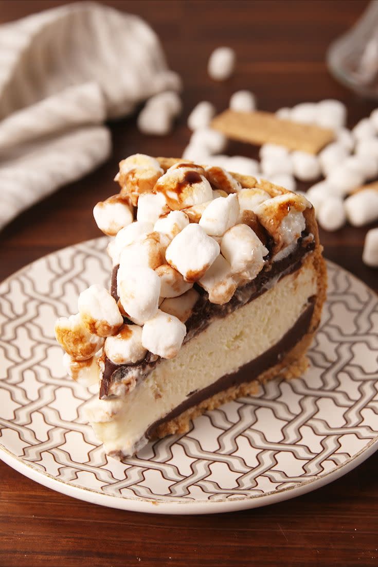 <p>S'mores make everything better, even cheesecake.</p><p>Get the recipe from <a href="https://www.delish.com/cooking/recipe-ideas/recipes/a54150/smores-cheesecake-recipe/" rel="nofollow noopener" target="_blank" data-ylk="slk:Delish;elm:context_link;itc:0;sec:content-canvas" class="link ">Delish</a>.</p>