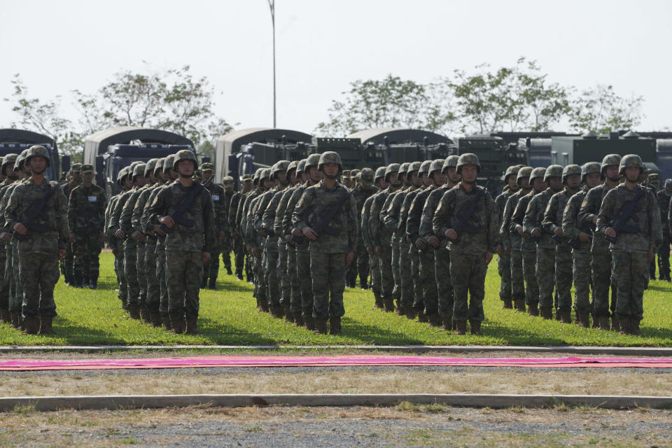 Chinese military personnel line up during the Golden Dragon military exercise in Svay Chok village, Kampong Chhnang province, north of Phnom Penh Cambodia, Thursday, May 16, 2024. Cambodia and China on Thursday kicked off their annual Golden Dragon military exercise to strengthen cooperation and exchange military experiences. (AP Photo/Heng Sinith)