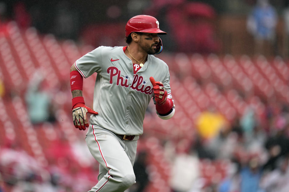 Philadelphia Phillies' Nick Castellanos heads to first on an RBI single during the sixth inning of a baseball game against the St. Louis Cardinals Wednesday, April 10, 2024, in St. Louis. (AP Photo/Jeff Roberson)