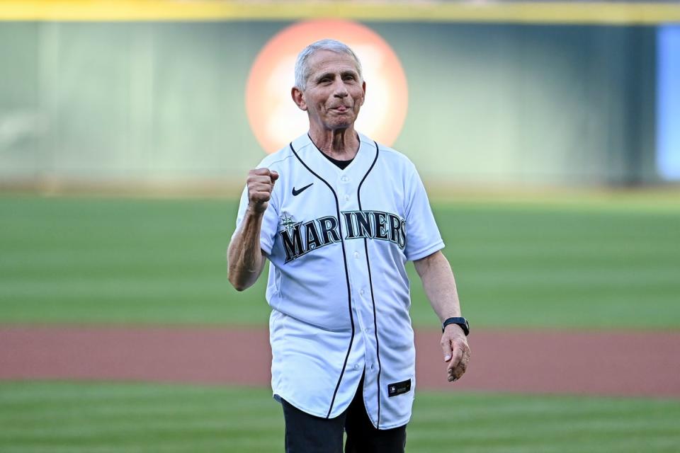 Dr. Anthony Fauci, director of the National Institute of Allergy and Infectious Diseases and chief medical advisor to the U.S. president, throws out the ceremonial first pitch before the game between the Seattle Mariners and the New York Yankees at T-Mobile Park on August 09, 2022 in Seattle, Washington (Getty Images)