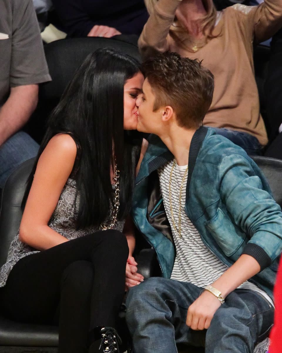 Justin and Selena dated on and off from 2011 to 2015. They are here together loved-up at a basketball game in 2012. Source: Getty