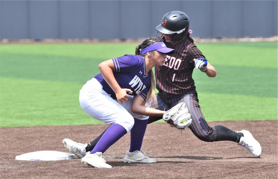 Aledo's Macy Graf, right, steals second in the first inning as Wylie shortstop Kat Martinez fields the throw.