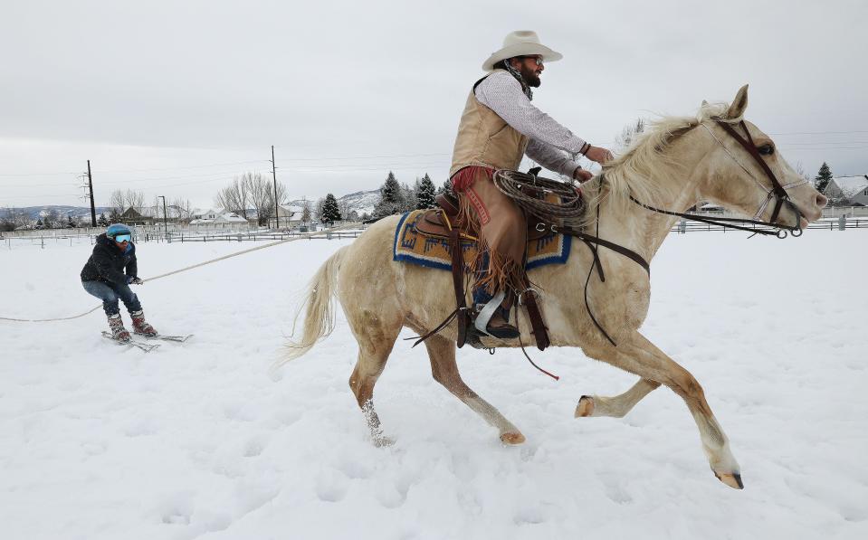 Trevor Howard, on horseback, and skier Scott Hoover practice for an upcoming skijoring competition in Heber City on Tuesday, Feb. 6, 2024. | Jeffrey D. Allred, Deseret News