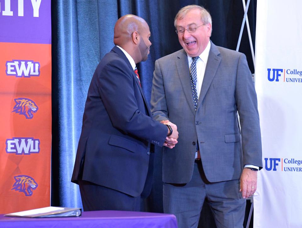 A. Zachary Faison, Jr. the President and Chief Executive Officer of Edward Waters University and W. Kent Fuchs, the President of the University of Florida have a light moment Wednesday after the two signed a memorandum of understanding of a collaboration between the two schools that would let EWU students earn UF nursing degrees.