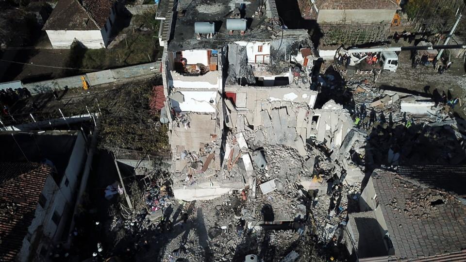 Rescuers search at a damaged building after a magnitude 6.4 earthquake in Thumane, western Albania, Tuesday, Nov. 26, 2019. (Photo: Hektor Pustina/AP)