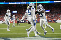 Indianapolis Colts cornerback Stephon Gilmore (5) celebrates his interception in the end zone against the Denver Broncos during the second half of an NFL football game, Thursday, Oct. 6, 2022, in Denver. (AP Photo/David Zalubowski)